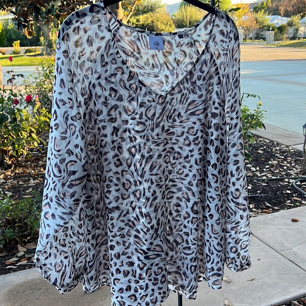 Beautiful CAbi blouse with fun print.